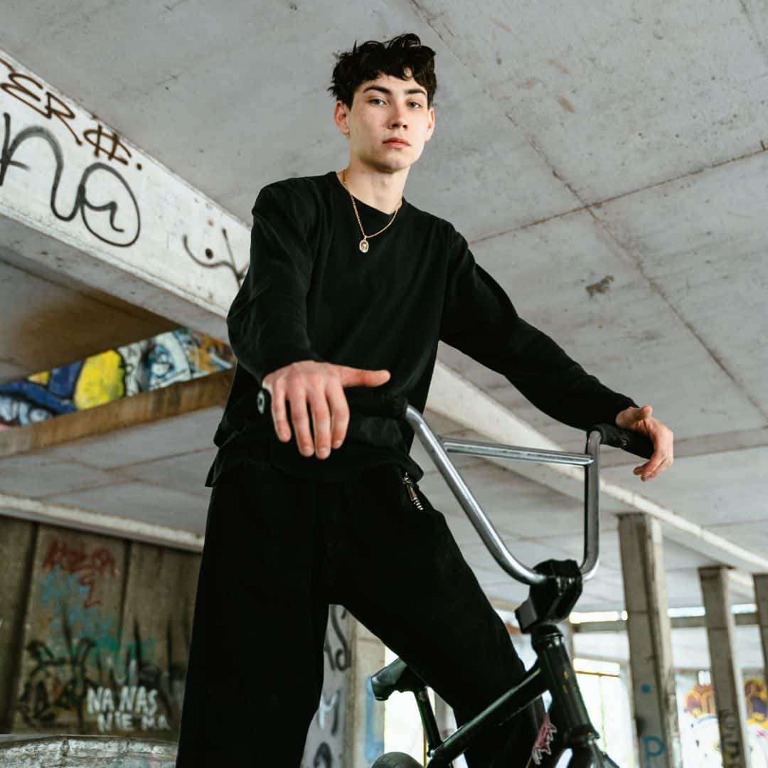 Young Man on Bike