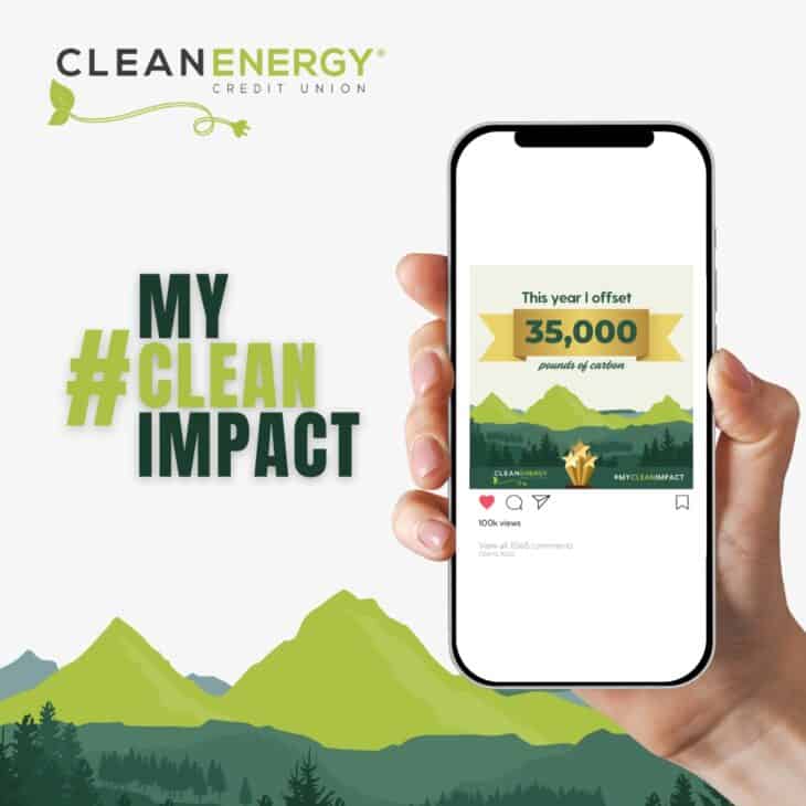Hand holding smartphone displaying carbon offset achievement by Clean Energy CU.