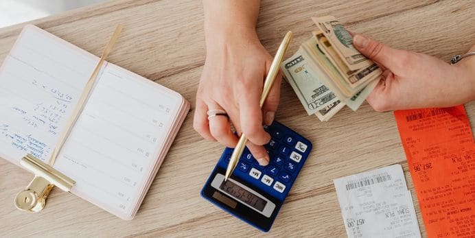 A photo of someone paying bills.