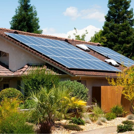 Photo of a home with solar panels.